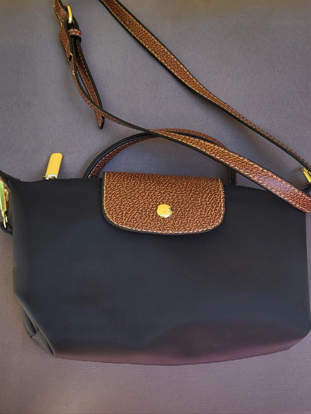 NEW -  Elegant Black Crossbody with Brown Flap and Strap